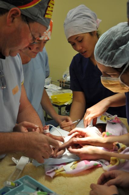 the surgical team rallys around the smallest cardiac patient in Tonga