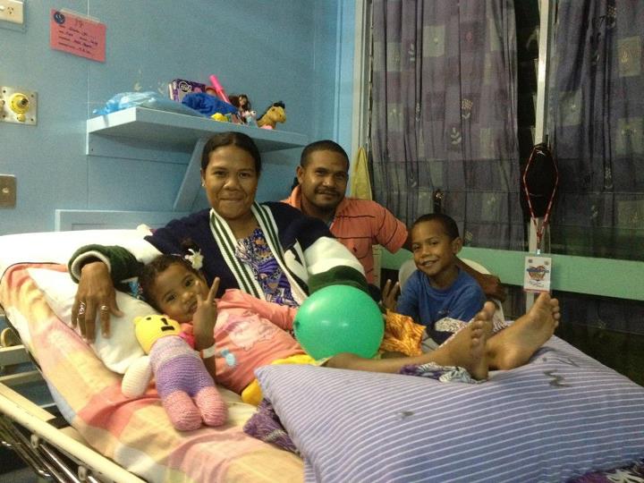 releived parents after successful heart surgery on their child