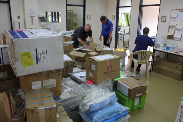 In Rwanda packing equipment for the trip back to Australia