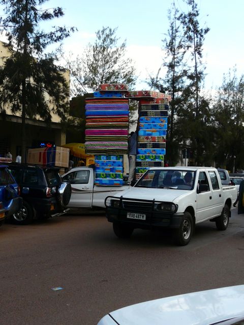 Interesting stack of mattresses on a truck in Rwanda