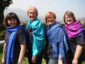 displaying the shawls from Nepal